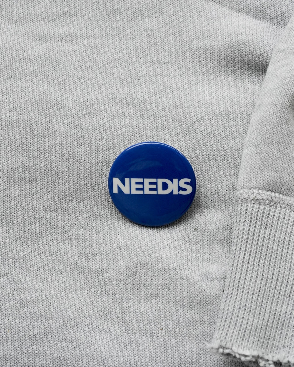 NEEDIS original Pin Badge