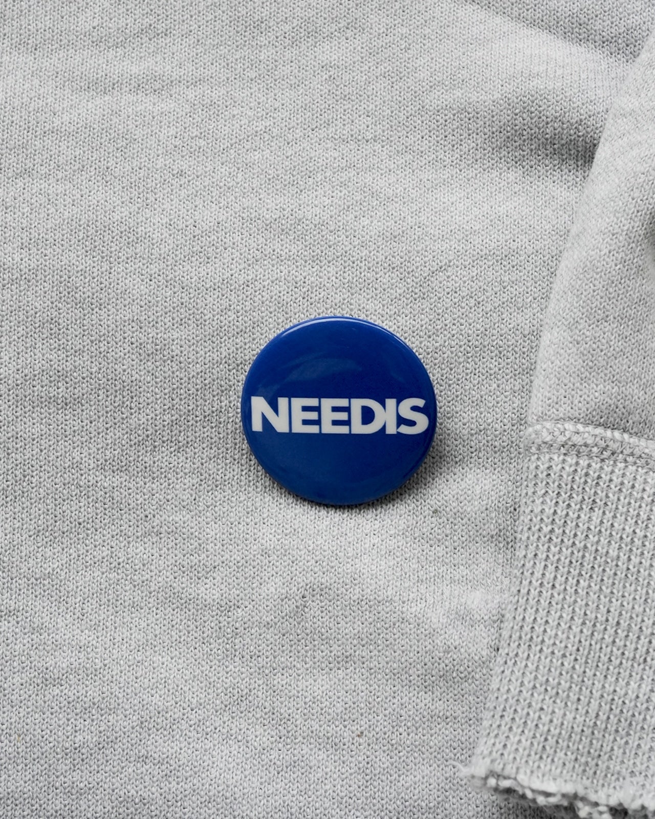 NEEDIS original Pin Badge