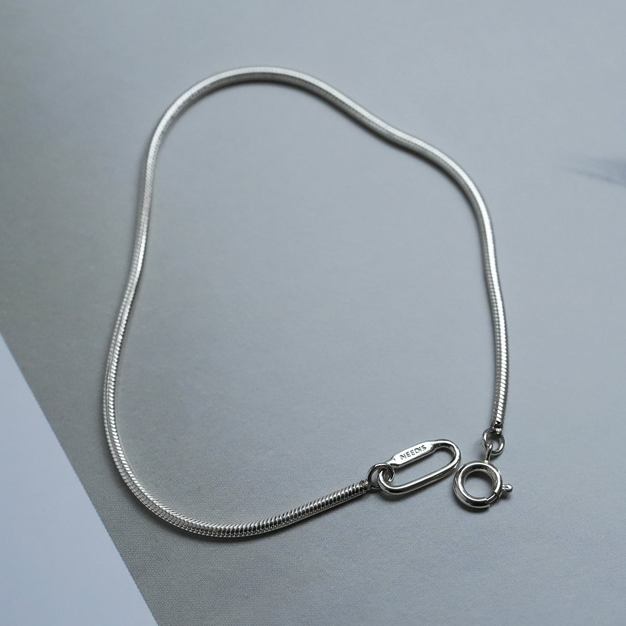 NEEDIS Snake Chain Bracelet